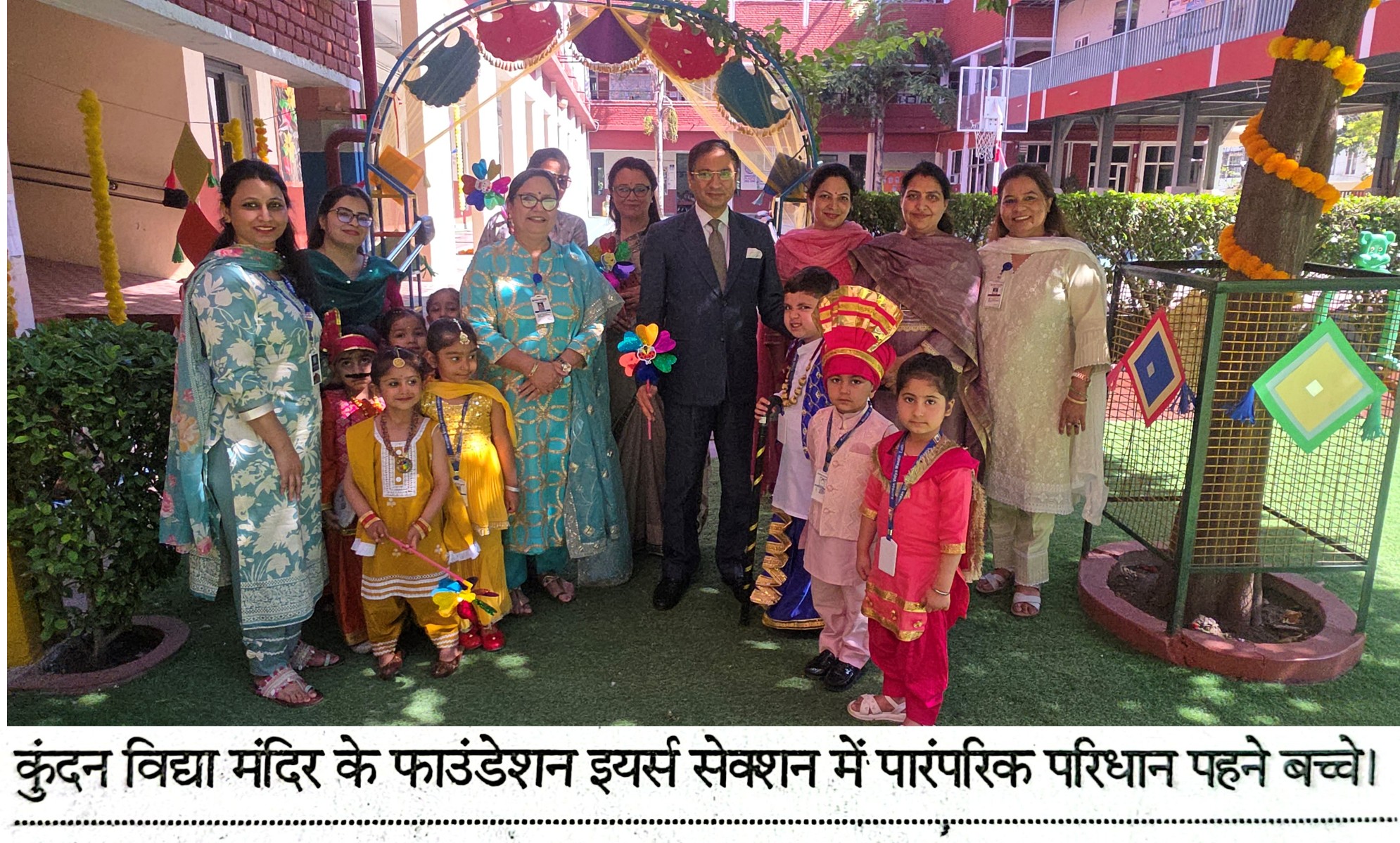 A CHILD WEARING TRADITIONAL ATTIRE IN THE FOUNDATION YEARS SECTION OF KUNDAN VIDYA MANDIR.